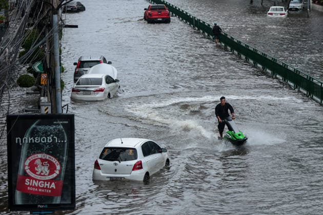 September 27, 2026, Bangkok, Bangkok, Thailand: A man rides a jet ski along a flooded Phetchaburi Road after 48 hours of continuous torrential rain caused widespread flash flooding across Bangkok, Thailand, September 27, 2026. Bangkok Thailand  - ZUMAp219 20260927_zip_p219_027 Copyright: xNattaphonxPhanphongsanonx