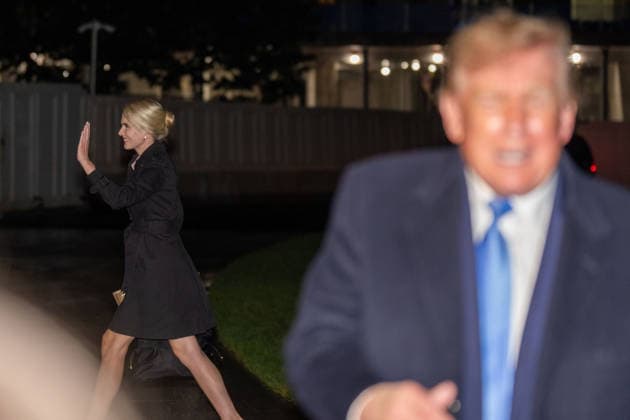 September 27, 2026, Washington, District Of Columbia, USA: NATALIE HARP waves to someone as she walks behind President DONALD TRUMP while he speaks to the press after arriving back at the White House aboard Marine One in Washington DC. Washington USA  - ZUMAs365 20260927_znp_s365_012 Copyright: xJoeyxSussmanx