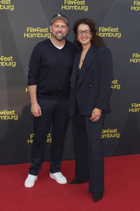 Steven Gätjen and Malika Rabahallah at the premiere of the feature film *Wild Horse Nine* at the 34th Filmfest Hamburg 2026 at Cinemaxx Dammtor in Hamburg, September 27, 2029 Foto:xgbrcix xFuturexImagex nine_6504
