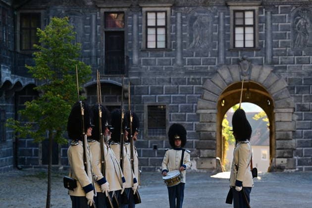 To mark the Czech Statehood Day and the St. Wenceslas city festivities, the Schwarzenberg Guards (Schwarzenberg Grenadier Guard) raised their flags in front of the guardhouse in the second castle courtyard in Cesky Krumlov, Czech Republic, on September 28, 2026. (CTKxPhoto VaclavxPancer) CTKPhotoP2026092802502  CTKPhotoP2026092802502