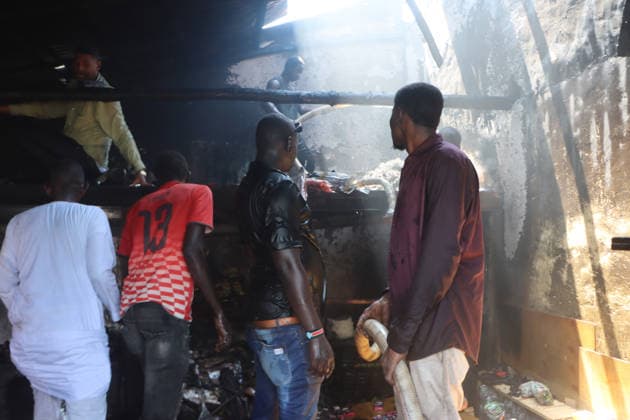 September 28, 2026, Juba, Ces Juba, South Sudan: Firefighters and residents work to extinguish a blaze that engulfed four shops at Konyo Konyo Market in Juba, South Sudan, amid reports that illegal electrical connections may have contributed to the fire. No casualties or extent of property damage have been officially confirmed. Juba South Sudan  - ZUMAb132 20260928_zip_b132_002 Copyright: xSamirxBolx