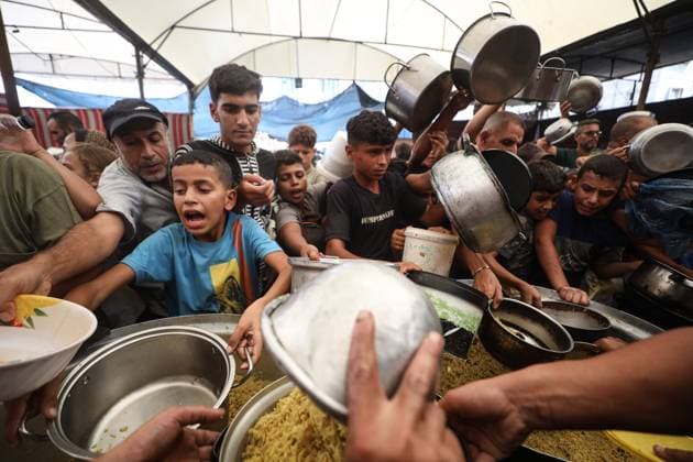 Hot meal distribution in Gaza GAZA CITY, GAZA, PALESTINE - SEPTEMBER 28: Palestinians, including children carrying cooking pots, gather to receive hot meals distributed in the Nuseirat Refugee Camp in Gaza City, Gaza, Palestine on September 28, 2026. The ongoing Israeli attacks despite the ceasefire have exacerbated severe food shortages across the region. Hassan Jedi Anadolu Gaza City Gaza. Editorial use only. Please get in touch for any other usage.  Copyright: x2026xAnadoluxHassanxJedix