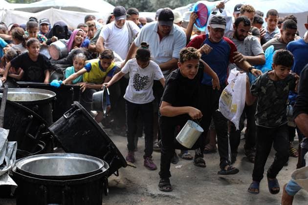 Hot meal distribution in Gaza GAZA CITY, GAZA, PALESTINE - SEPTEMBER 28: Palestinians, including children carrying cooking pots, gather to receive hot meals distributed in the Nuseirat Refugee Camp in Gaza City, Gaza, Palestine on September 28, 2026. The ongoing Israeli attacks despite the ceasefire have exacerbated severe food shortages across the region. Hassan Jedi Anadolu Gaza City Gaza. Editorial use only. Please get in touch for any other usage.  Copyright: x2026xAnadoluxHassanxJedix