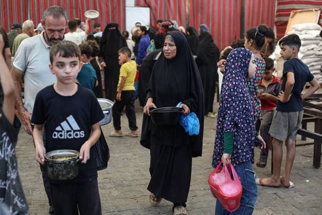 Hot meal distribution in Gaza GAZA CITY, GAZA, PALESTINE - SEPTEMBER 28: Palestinians, including children carrying cooking pots, gather to receive hot meals distributed in the Nuseirat Refugee Camp in Gaza City, Gaza, Palestine on September 28, 2026. The ongoing Israeli attacks despite the ceasefire have exacerbated severe food shortages across the region. Hassan Jedi Anadolu Gaza City Gaza. Editorial use only. Please get in touch for any other usage.  Copyright: x2026xAnadoluxHassanxJedix