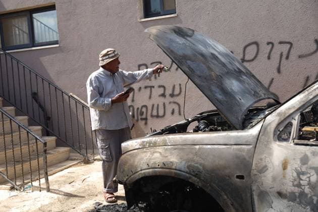 Settlers Set Fire To Vehicle And Spray Graffiti In Deir Abu Mash™al DEIR ABU MASHA™AL, PALESTINE SEPTEMBER 28, 2026: Israeli settlers attacked the village of Deir Abu Mash™al, northwest of Ramallah, during the early hours of the morning, according to local sources. During the attack, settlers set fire to a vehicle belonging to Ahmed Shehadeh Zahran, also known as Abu Zaher, and spray-painted slogans on the walls of his home. The incident is part of a series of reported settler attacks affecting Palestinian communities in the occupied West Bank. Ramallah Palestine, State of Copyright: x xSalmanxMohsenxAlkhatibx xJNAxPressx