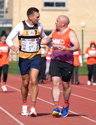 The Princess Royal Meets Sir Kevin Sinfield During His 7 In 7 Challenge YORK, ENGLAND - SEPTEMBER 28: Sir Kevin Sinfield (L) runs around the track with an MND supporter during the 7 in 7: The Grand Finale at the University of York Athletics Track on September 28, 2026 in York, England. Sir Kevin Sinfield is running an ultra marathon every day for seven days to raise money for motor neurone disease (MND) in memory of his former Leeds Rhinos teammate Rob Burrow., Credit:Dominic Lipinski PA ROTA - B68 Avalon United Kingdom, England, York  Copyright: xDominicxLipinskix xPAxROTAx-xB68x xAvalonx 1138881210