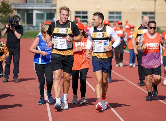 The Princess Royal Meets Sir Kevin Sinfield During His 7 In 7 Challenge YORK, ENGLAND - SEPTEMBER 28: Lewis Moody and Sir Kevin Sinfield run around the track with MND supporters during the 7 in 7: The Grand Finale at the University of York Athletics Track on September 28, 2026 in York, England. Sir Kevin Sinfield is running an ultra marathon every day for seven days to raise money for motor neurone disease (MND) in memory of his former Leeds Rhinos teammate Rob Burrow., Credit:Dominic Lipinski PA ROTA - B68 Avalon United Kingdom, England, York  Copyright: xDominicxLipinskix xPAxROTAx-xB68x xAvalonx 1138881229