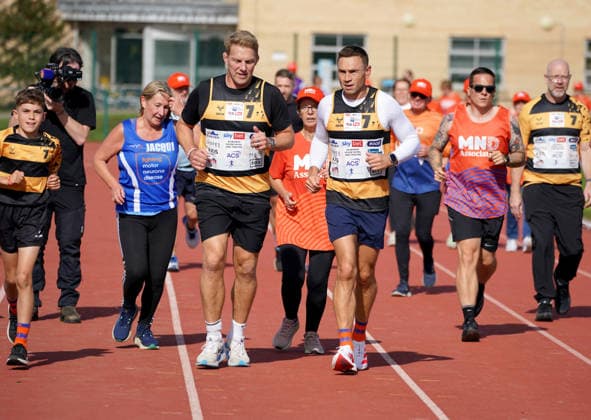 The Princess Royal Meets Sir Kevin Sinfield During His 7 In 7 Challenge YORK, ENGLAND - SEPTEMBER 28: Lewis Moody and Sir Kevin Sinfield run around the track with MND supporters during the 7 in 7: The Grand Finale at the University of York Athletics Track on September 28, 2026 in York, England. Sir Kevin Sinfield is running an ultra marathon every day for seven days to raise money for motor neurone disease (MND) in memory of his former Leeds Rhinos teammate Rob Burrow., Credit:Dominic Lipinski PA ROTA - B68 Avalon United Kingdom, England, York  Copyright: xDominicxLipinskix xPAxROTAx-xB68x xAvalonx 1138881234
