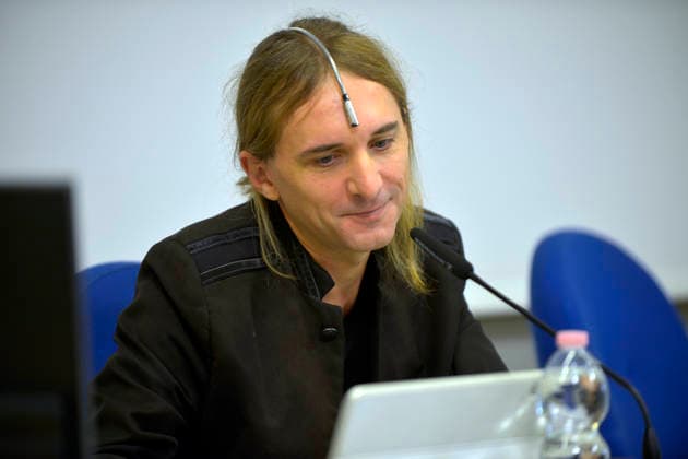 IPA89072978 - Lucca, September 28, 2026 At the San Micheletto complex as part of the Lucca Film Festival, British artist Neil Harbisson held a masterclass titled OVER THE REAL. Since 2004, Harbisson has been using an antenna implanted in his skull which has now become an organ to him that allows him to perceive the frequencies of colors, infrared, and ultraviolet light, as well as to access servers. In the photo: Neil Harbisson with his antenna.  Copyright: xRobertoCappelloxfotografox xRobertoCappelloxfotografox IPA89072978