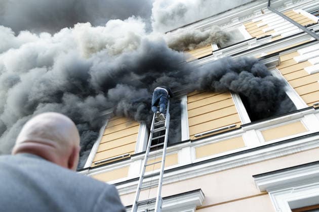 A man goes down a telescopic ladder to escape from the National Academy of Sciences building, which is engulfed in flames after being hit by a Russian drone, in Kyiv, Ukraine, September 28, 2026. One person was killed, and three others were injured in the attack.(Photo by Kyrylo Chubotin Ukrinform) Russian drone strikes Ukrainian National Academy of Sciences building in KyivRussian drone strikes Ukrainian National Academy of Sciences building in Kyiv  Copyright: xKirillxChubotinx
