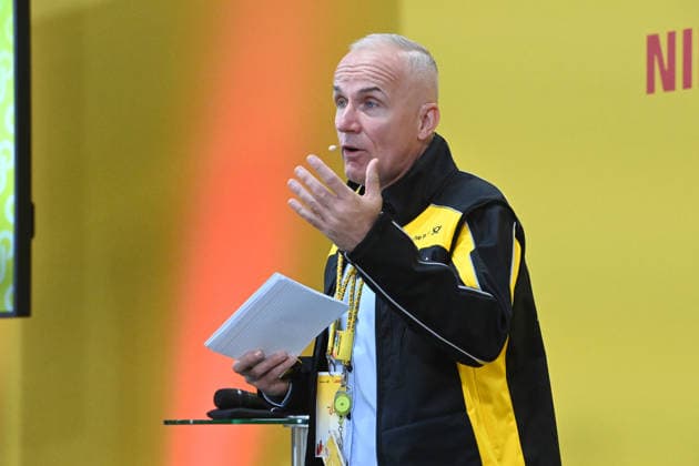 DHL Branch Manager Ingo KUTSCH, during his speech; Minister Laumann visits the Deutsche Post and DHL distribution center in Düsseldorf on September 28, 2026,