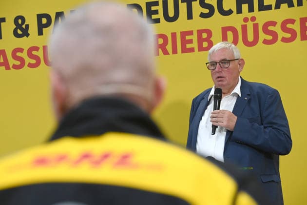Karl Josef LAUMANN, CDU, Minister of Labor, Health, and Social Affairs of the State of North Rhine-Westphalia, during his speech; Minister Laumann visits a Deutsche Post and DHL distribution center in Düsseldorf on September 28, 2026,