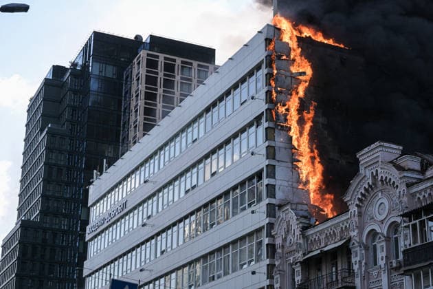 Russian drone attacks in Kyiv KYIV, UKRAINE - SEPTEMBER 28: Flames and dense black smoke billow from the damaged building of the Dobrobut private medical centre following a Russian jet-powered drone strike in central Kyiv, Ukraine on September 28, 2026. Emergency crews and firefighters conducted intense search and rescue operations as multiple fires burned across the capital s Shevchenkivskyi district, where another drone attack earlier destroyed the nearby National Academy of Sciences building. Danylo Antoniuk Anadolu Kyiv Ukraine. Editorial use only. Please get in touch for any other usage.  Copyright: x2026xAnadoluxDanyloxAntoniukx
