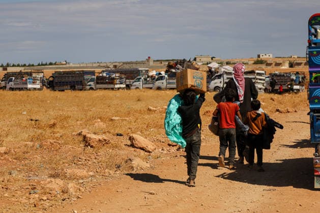 65 families return to their homes from Rasm al-Akhdar camp in Manbij MANBIJ, SYRIA - SEPTEMBER 28: A total of 65 families, comprising around 300 people living at Rasm al-Akhdar camp in the Manbij area of northern Syria leave the camp to return to their homes in Aleppo and Raqqa, on September 28, 2026. The convoy of families set off for the areas of Maskanah and Deir Hafir in Aleppo province and locations in Raqqa. The Syrian Red Crescent distributed emergency aid packages to the families leaving the camp. Nebieha Altaha Anadolu Manbij Syria. Editorial use only. Please get in touch for any other usage.  Copyright: x2026xAnadoluxNebiehaxAltahax