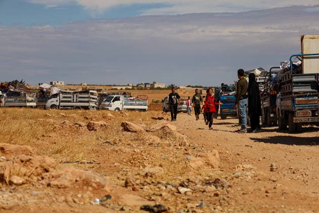 65 families return to their homes from Rasm al-Akhdar camp in Manbij MANBIJ, SYRIA - SEPTEMBER 28: A total of 65 families, comprising around 300 people living at Rasm al-Akhdar camp in the Manbij area of northern Syria leave the camp to return to their homes in Aleppo and Raqqa, on September 28, 2026. The convoy of families set off for the areas of Maskanah and Deir Hafir in Aleppo province and locations in Raqqa. The Syrian Red Crescent distributed emergency aid packages to the families leaving the camp. Nebieha Altaha Anadolu Manbij Syria. Editorial use only. Please get in touch for any other usage.  Copyright: x2026xAnadoluxNebiehaxAltahax