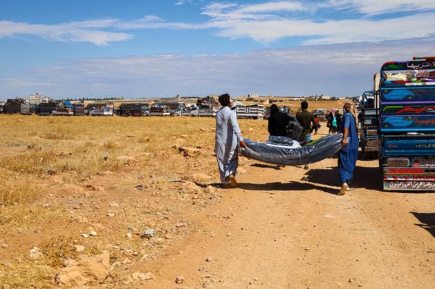 65 families return to their homes from Rasm al-Akhdar camp in Manbij MANBIJ, SYRIA - SEPTEMBER 28: A total of 65 families, comprising around 300 people living at Rasm al-Akhdar camp in the Manbij area of northern Syria leave the camp to return to their homes in Aleppo and Raqqa, on September 28, 2026. The convoy of families set off for the areas of Maskanah and Deir Hafir in Aleppo province and locations in Raqqa. The Syrian Red Crescent distributed emergency aid packages to the families leaving the camp. Nebieha Altaha Anadolu Manbij Syria. Editorial use only. Please get in touch for any other usage.  Copyright: x2026xAnadoluxNebiehaxAltahax