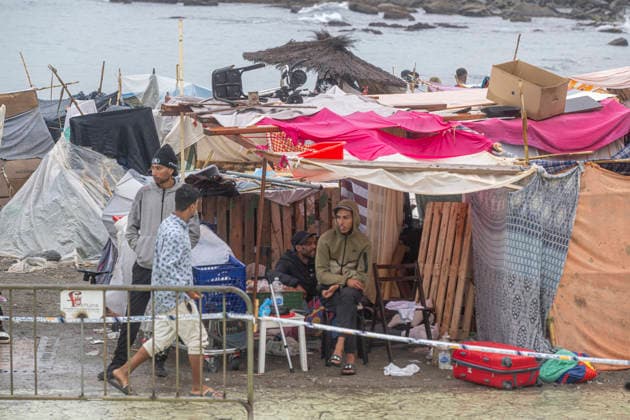Rain Affects the Settlements on El Trampolín Beach in Ceuta Migrants Remain in the Settlements on El Trampolín Beach Despite the Rain, as of September 28, 2026, in Ceuta, Spain. Around 3,000 migrants remain in makeshift encampments on Ceuta’s beaches following the massive influx recorded in late July. The continuous rain is flooding the ground and damaging the shacks built from reeds, plastic, cardboard, and sheets on Trampolín Beach. SEPTEMBER 28, 2026. Ceuta, Spain  Copyright: xMarcosxMorenox 7806269