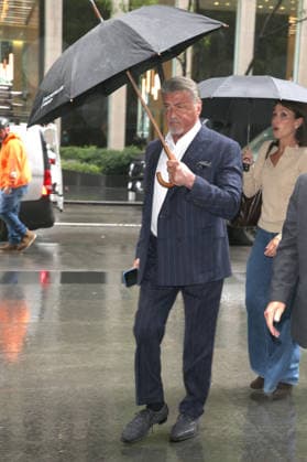 September 28, 2026, New York, New York, USA: SYLVESTER STALLONE arrives with umbrella on a rainy day at SiriusXM in Midtown Manhattan, New York, City New York USA  - ZUMAh16_ 20260928_zaf_h16_003 Copyright: xDanxHerrickx