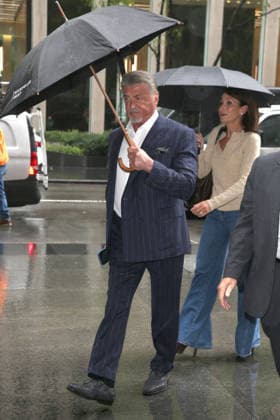 September 28, 2026, New York, New York, USA: SYLVESTER STALLONE arrives with umbrella on a rainy day at SiriusXM in Midtown Manhattan, New York, City New York USA  - ZUMAh16_ 20260928_zaf_h16_004 Copyright: xDanxHerrickx