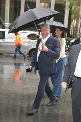 September 28, 2026, New York, New York, USA: SYLVESTER STALLONE arrives with umbrella on a rainy day at SiriusXM in Midtown Manhattan, New York, City New York USA  - ZUMAh16_ 20260928_zaf_h16_007 Copyright: xDanxHerrickx