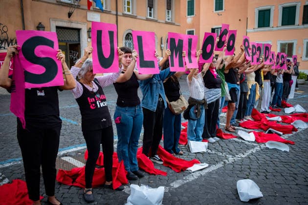 September 28, 2026, Rome, Rm, Italy: To mark International Safe Abortion Day, the feminist and transfeminist movement Non Una Di Meno (Not One Less) is holding a rally outside the Ministry of Health, reiterating their call for The right to free, safe, and accessible abortion for everyone who requests it . Protesters take off the red cloaks and white bonnets from The Handmaid s Tale as a visual symbol to defend abortion access and oppose reproductive restrictions. My body my choice reads the sign. Rome Italy - ZUMAg256 20260928_znp_g256_004 Copyright: xMarcoxDixGianvitox