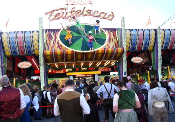 Munich, September 28, 2026, Theresienwiesn, Oktoberfest, carnival vendors, rides, Ferris wheel, visitors, photo, Munich