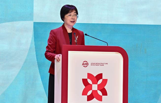 Opening ceremony of the 11th annual meeting of the Asian Infrastructure Investment Bank (AIIB) in Doha Asian Infrastructure Investment Bank (AIIB) President and Chair of the Board of Directors Zou Jiayi speaks during the opening ceremony of the 11th Annual Meeting of the Board of Governors of the Asian Infrastructure Investment Bank (AIIB) in Doha,Qatar on September 28, 2026 DOHA Qatar Copyright: xNOUSHADx