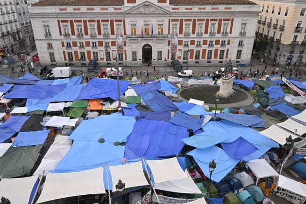 Tent protest continues against housing crisis in Spain MADRID, SPAIN - SEPTEMBER 29 : Protesters continue their tent-city demonstration at Sol Square, demanding solutions from central and regional governments to combat the country s housing crisis, following the court-ordered and police-enforced eviction on September 23 of 87-year-old Mari Carmen, a symbolic figure who became unable to afford the rent on her 70-year residence on September 29, 2026 in Madrid, Spain. Burak Akbulut Anadolu Madrid Spain. Editorial use only. Please get in touch for any other usage.  Copyright: x2026xAnadoluxBurakxAkbulutx