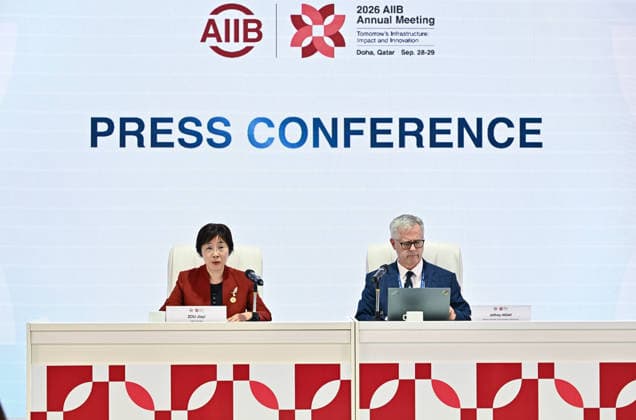 Opening ceremony of the 11th annual meeting of the Asian Infrastructure Investment Bank (AIIB) in Doha Asian Infrastructure Investment Bank (AIIB) President and Chair of the Board of Directors Zou Jiayi (L) addresses a press conference alongside Director General, Communications of Asian Infrastructure Investment Bank (AIIB) Jeffrey Hiday (R) at the 11th Annual Meeting of the Board of Governors of the Asian Infrastructure Investment Bank (AIIB) in Doha,Qatar on September 28, 2026 DOHA Qatar Copyright: xNOUSHADx