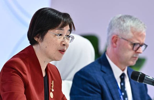 Opening ceremony of the 11th annual meeting of the Asian Infrastructure Investment Bank (AIIB) in Doha Asian Infrastructure Investment Bank (AIIB) President and Chair of the Board of Directors Zou Jiayi (L) addresses a press conference alongside Director General, Communications of Asian Infrastructure Investment Bank (AIIB) Jeffrey Hiday (R) at the 11th Annual Meeting of the Board of Governors of the Asian Infrastructure Investment Bank (AIIB) in Doha,Qatar on September 28, 2026 DOHA Qatar Copyright: xNOUSHADx
