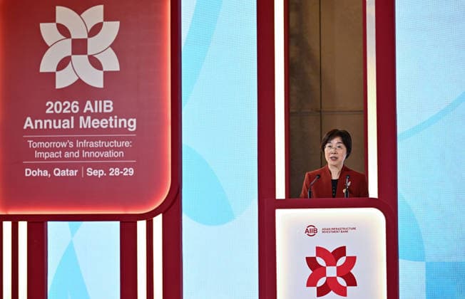 Opening ceremony of the 11th annual meeting of the Asian Infrastructure Investment Bank (AIIB) in Doha Asian Infrastructure Investment Bank (AIIB) President Zou Jiayi delivers opening speech during the Flagship Seminar titled Scaling up Climate Finance for Impact: Turning Policy Reform into Resilient Growth at the 11th Annual Meeting of the Board of Governors of the Asian Infrastructure Investment Bank (AIIB) in Doha,Qatar on September 28, 2026 DOHA Qatar Copyright: xNOUSHADx