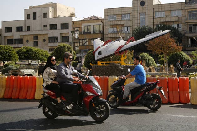 Ballistic missiles and unmanned aerial vehicles displayed in Tehran TEHRAN, IRAN - SEPTEMBER 29: ( RESTRICTIONS: NO Access Israel Media Persian Language TV Stations Outside Iran Strictly No Access BBC Persian VOA Persian Manoto TV Iran International TV ) People ride motorbikes as ballistic missiles, air defense systems and unmanned aerial vehicles are displayed at Baharestan Square as part of Iran s Sacred Defense Week amid ongoing tensions in Tehran, Iran, on September 29, 2026. Fatemeh Bahrami Anadolu Tehran Iran. Editorial use only. Please get in touch for any other usage.  Copyright: x2026xAnadoluxFatemehxBahramix