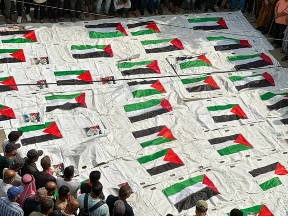 Gaza City Mass Funeral Mourners gather around bodies wrapped in shrouds during a mass funeral in Gaza City, Gaza Strip, on September 29, 2026. The remains of 43 Palestinians were recently recovered by Civil Defense crews from the rubble of a residential building destroyed in an Israeli strike earlier in the war. Gaza Gaza Strip Palestinian Territories Copyright: xDoaaxAlbazx