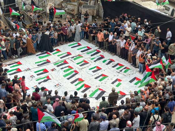Gaza City Mass Funeral Mourners gather around bodies wrapped in shrouds during a mass funeral in Gaza City, Gaza Strip, on September 29, 2026. The remains of 43 Palestinians were recently recovered by Civil Defense crews from the rubble of a residential building destroyed in an Israeli strike earlier in the war. Gaza Gaza Strip Palestinian Territories Copyright: xDoaaxAlbazx