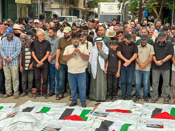 Gaza City Mass Funeral Palestinians stand in prayer over bodies wrapped in shrouds during a mass funeral in Gaza City, Gaza Strip, on September 29, 2026. The remains of 43 Palestinians were recently recovered by Civil Defense crews from the rubble of a residential building destroyed in an Israeli strike earlier in the war. Gaza Gaza Strip Palestinian Territories Copyright: xDoaaxAlbazx