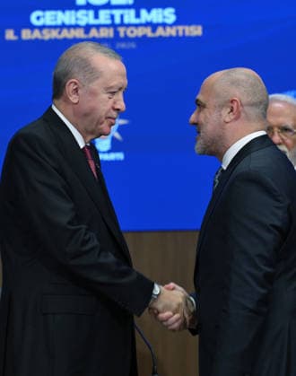 Turkish President and Leader of the Justice and Development Party Recep Tayyip Erdogan ANKARA, TURKIYE - SEPTEMBER 29: (----EDITORIAL USE ONLY - MANDATORY CREDIT - TURKISH PRESIDENCY HANDOUT - NO MARKETING NO ADVERTISING CAMPAIGNS - DISTRIBUTED AS A SERVICE TO CLIENTS----) Turkish President and Justice and Development Party (AK Party) Chairman Recep Tayyip Erdogan (L) presents party badges to nine mayors who have joined the AK Party during the Meeting with Provincial Heads at the AK Party Congress Center in Ankara, Turkiye, on September 29, 2026. Turkish Presidency Handout Anadolu Ankara Turkey. Editorial use only. Please get in touch for any other usage.  Copyright: x2026xAnadoluxTurkishxPresidencyx xHandoutx