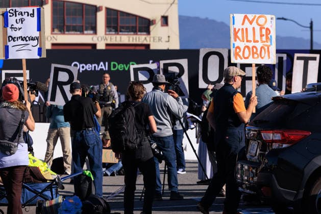 OpenAI DevDay Demonstration in San Francisco SAN FRANCISCO, UNITED STATES - SEPTEMBER 29: Demonstrators gather outside OpenAI DevDay at Fort Mason to call on OpenAI and its CEO Sam Altman to end contracts with the U.S. Military and Immigration and Customs Enforcement, in San Francisco, United States on September 29, 2026. Nikolas Liepins Anadolu San Francisco United States. Editorial use only. Please get in touch for any other usage.  Copyright: x2026xAnadoluxNikolasxLiepinsx