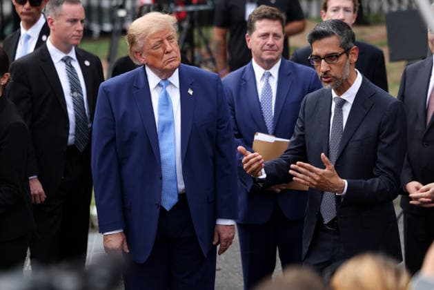 Google CEO Sundar Pichai speaks to reporters as President Donald Trump looks on outside the White House on Tuesday, September 29, 2026 in Washington, D.C. Trump held a meeting on super intelligence earlier with tech CEOs in the East Room.  WAX20260929914 TierneyxL.xCross