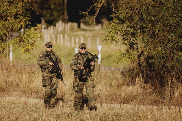 Soldiers in a field, photographed during the Vigilant Roland II exercise conducted by the Bundeswehr s Homeland Security Division in a public area in Stendal, September 29, 2026. As part of the exercise, the soldiers are training, among other things, to provide aid following a car accident and to prevent espionage attempts by enemy forces. Stendal, Germany Copyright: xFlorianxGaertnerx