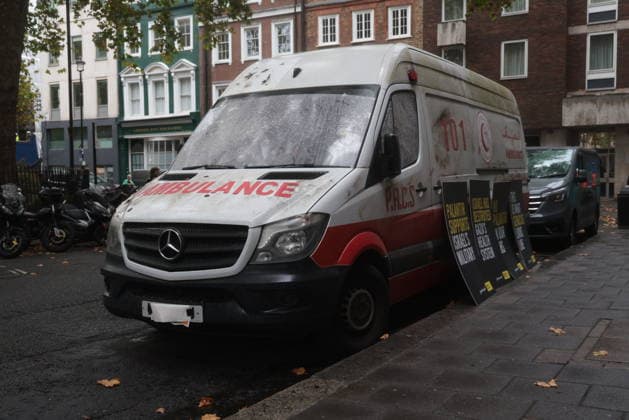 . 30 09 2026. London, United Kingdom. Amnesty International UK¯ Protest Palantir. A life-size Palestinian ambulance, riddled with bullet holes and partially blown apart, on the doorstep of Palantir s London headquarters, as campaigners call on the Government not to extend its NHS England contract with the controversial US technology company.  xMartynxWheatleyx xi-Imagesx IIM-27032-0002