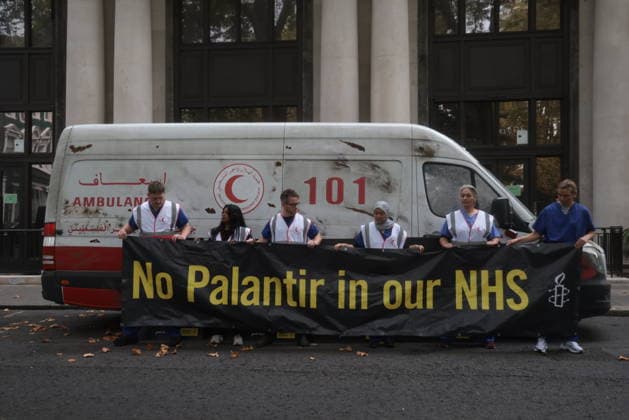 . 30 09 2026. London, United Kingdom. Amnesty International UK¯ Protest Palantir. A life-size Palestinian ambulance, riddled with bullet holes and partially blown apart, on the doorstep of Palantir s London headquarters, as campaigners call on the Government not to extend its NHS England contract with the controversial US technology company.  xMartynxWheatleyx xi-Imagesx IIM-27032-0004