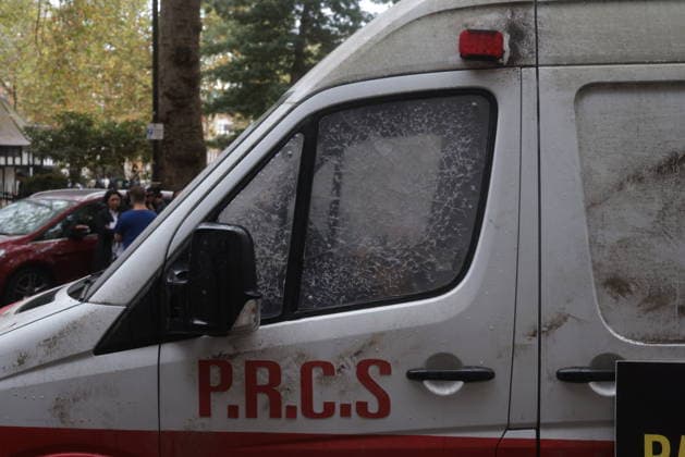 . 30 09 2026. London, United Kingdom. Amnesty International UK¯ Protest Palantir. A life-size Palestinian ambulance, riddled with bullet holes and partially blown apart, on the doorstep of Palantir s London headquarters, as campaigners call on the Government not to extend its NHS England contract with the controversial US technology company.  xMartynxWheatleyx xi-Imagesx IIM-27032-0007