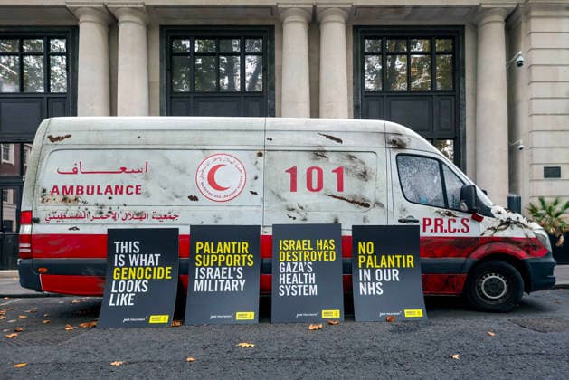 . 30 09 2026. London, United Kingdom. Amnesty International UK¯ Protest Palantir. A life-size Palestinian ambulance, riddled with bullet holes and partially blown apart, on the doorstep of Palantir s London headquarters, as campaigners call on the Government not to extend its NHS England contract with the controversial US technology company.  xMartynxWheatleyx xi-Imagesx IIM-27032-0010