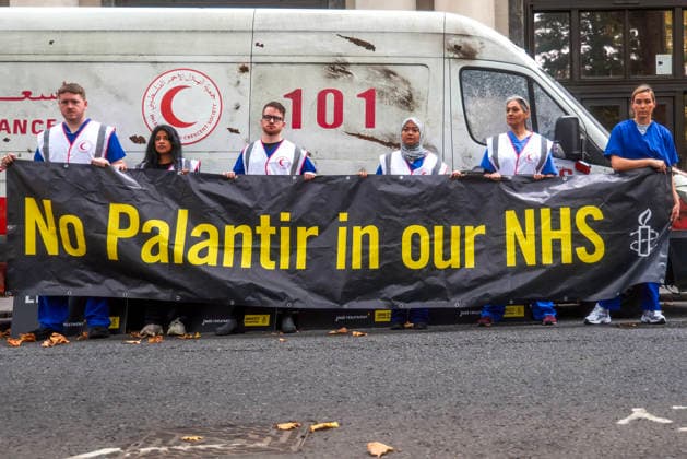 . 30 09 2026. London, United Kingdom. Amnesty International UK¯ Protest Palantir. A life-size Palestinian ambulance, riddled with bullet holes and partially blown apart, on the doorstep of Palantir s London headquarters, as campaigners call on the Government not to extend its NHS England contract with the controversial US technology company.  xMartynxWheatleyx xi-Imagesx IIM-27032-0014