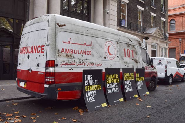 September 30, 2026, London, England, United Kingdom: A van made to look like a heavily damaged Gaza ambulance is parked outside Palantir headquarters in Soho Square as Amnesty International UK and Just Treatment stage a protest calling on the UK Government not to extend its NHS contract with the US tech company. London United Kingdom - ZUMAv130 20260930_zip_v130_014 Copyright: xVukxValcicx