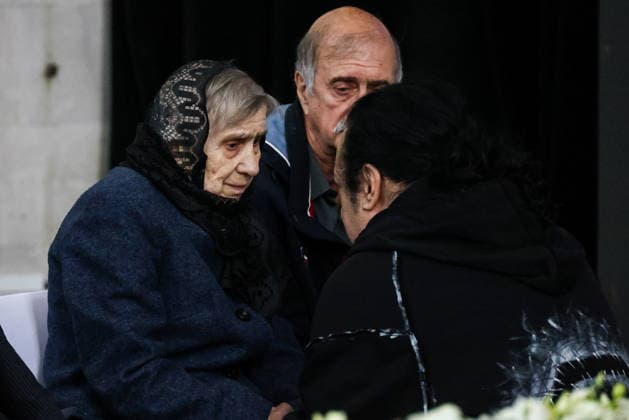 RUSSIA, MOSCOW - SEPTEMBER 30, 2026: Music critic Sergei Sosedov s mother attends her son s farewell ceremony at Troyekurovskoye Cemetery. Sosedov died in an accident in the Republic of Sakha (Yakutia) on September 23, at the age of 59. Artyom Geodakyan TASS  98563309