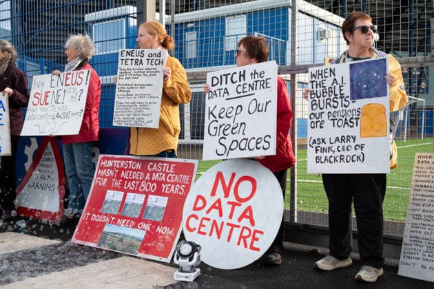 September 30, 2026, Kilmarnock, Scotland, UK: The Reject Hunterston Data Centre Campaign Group and Hurlford Rufus Data Centre Community Group held a protest outside a B2B business event in Kilmarnock. Both groups are campaigning against proposed hyperscale data centres in their local areas and sought to convey to the Ayrshire Chamber of Commerce and businesses attending the event, including Eneus Energy, the company behind the proposed 500MW Hunterston hyperscale data centre, that local communities oppose the developments. Kilmarnock UK - ZUMAs357 20260930_zip_s357_011 Copyright: xCameronxScottx