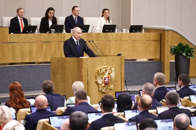 RUSSIA, MOSCOW - SEPTEMBER 30, 2026: Vladimir Putin, President of Russia, addresses the first plenary meeting of the Russian State Duma of the 9th convocation, with Vice Speakers Anna Kuznetsova, Vladislav Davankov, Maria Voropayeva and Vitaly Savelyev (R-L) in the background. Mikhail Tereshchenko TASS  98570080