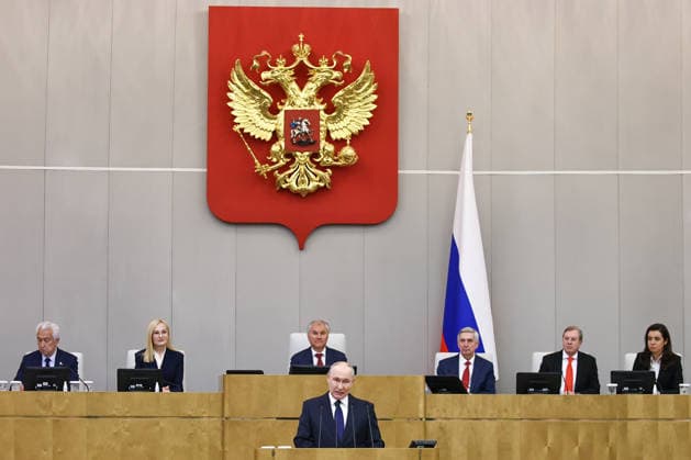 RUSSIA, MOSCOW - SEPTEMBER 30, 2026: Vladimir Putin, President of Russia, addresses the first plenary meeting of the Russian State Duma of the 9th convocation. Pictured in the background are Speaker Vyacheslav Volodin (3rd L), his deputies Vladimir Vasilyev, Irina Yarovaya (L-R), Maria Voropayeva, Vitaly Savelyev and Ivan Melnikov (R-L). Mikhail Tereshchenko TASS  98569954