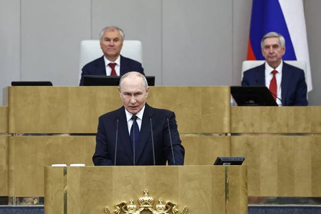 RUSSIA, MOSCOW - SEPTEMBER 30, 2026: Vladimir Putin, President of Russia, addresses the first plenary meeting of the Russian State Duma of the 9th convocation, with Speaker Vyacheslav Volodin (L) and his first deputy Ivan Melnikov in the background. Mikhail Tereshchenko TASS  98571225